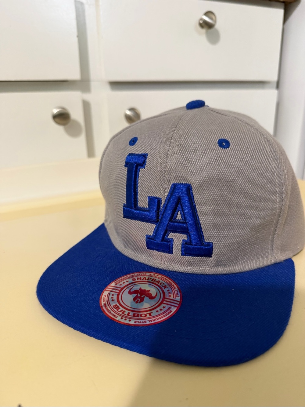 LA Embroidered Snapback Hat in Gray and Blue by